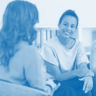 A counselor and client talking during a session