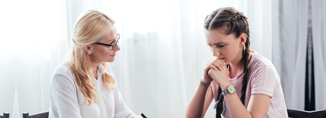 doctor counseling teen